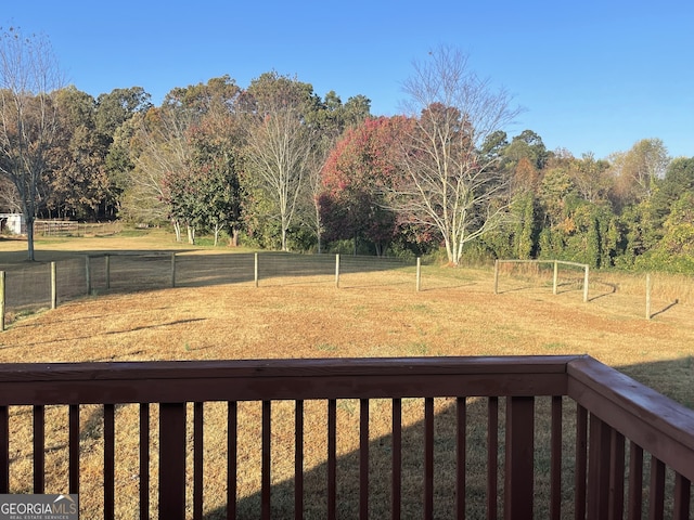 view of yard with a rural view