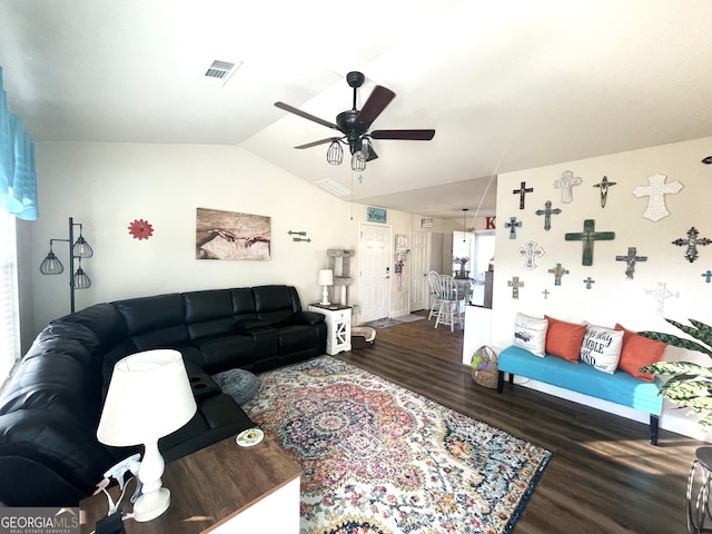 living room featuring lofted ceiling, ceiling fan, and dark hardwood / wood-style flooring