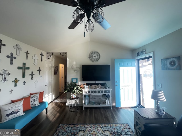 living room featuring lofted ceiling, ceiling fan, and dark hardwood / wood-style flooring