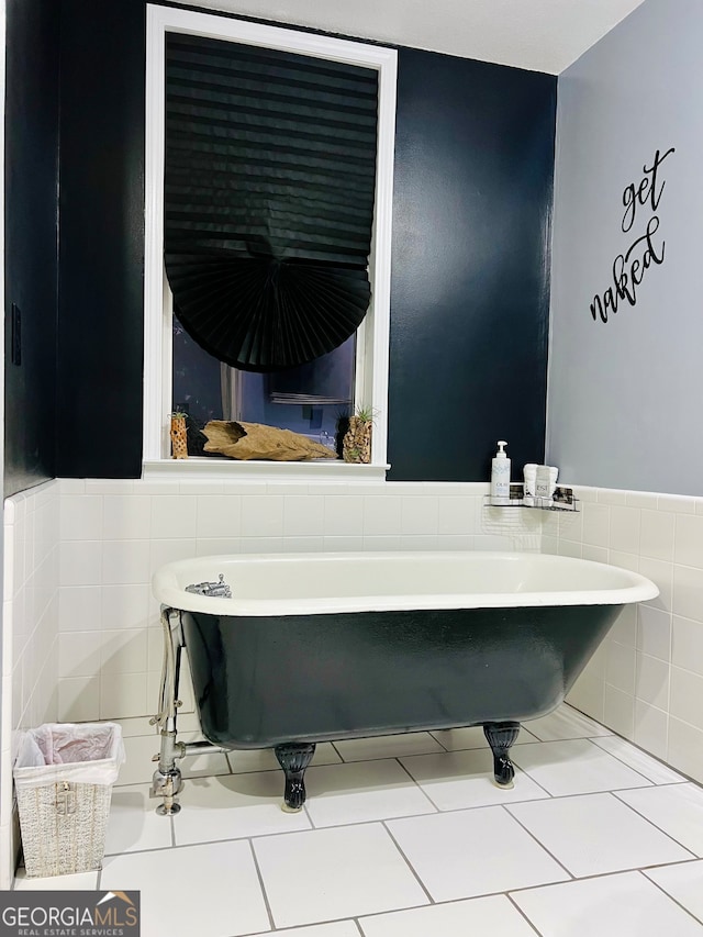 bathroom featuring a tub to relax in