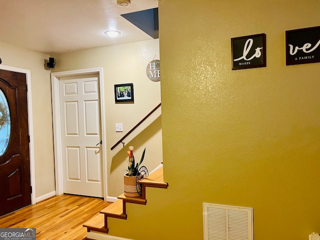 entrance foyer featuring light wood-type flooring