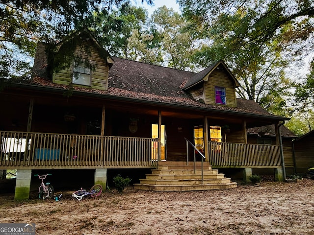 view of front of property featuring covered porch