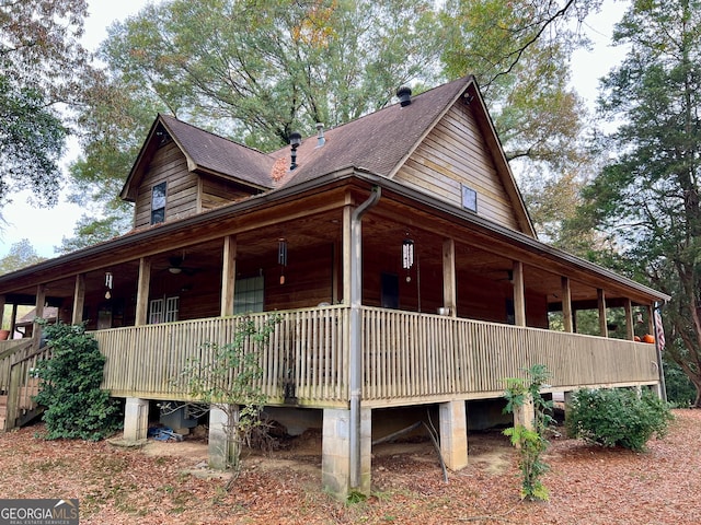 view of side of property featuring ceiling fan