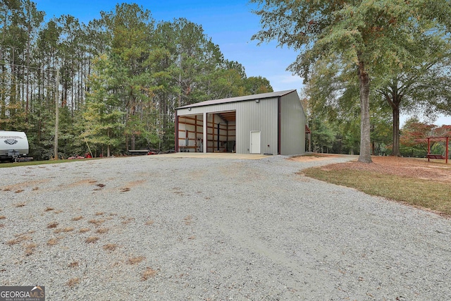 view of outbuilding featuring a garage