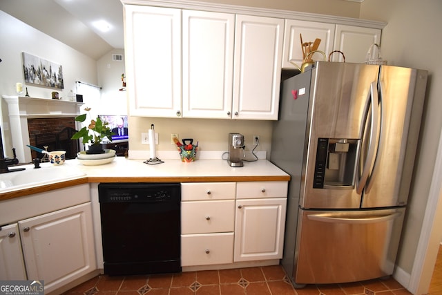 kitchen with white cabinetry, stainless steel fridge with ice dispenser, and black dishwasher