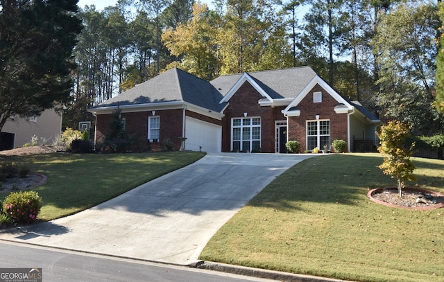 view of front of house featuring a front lawn and a garage