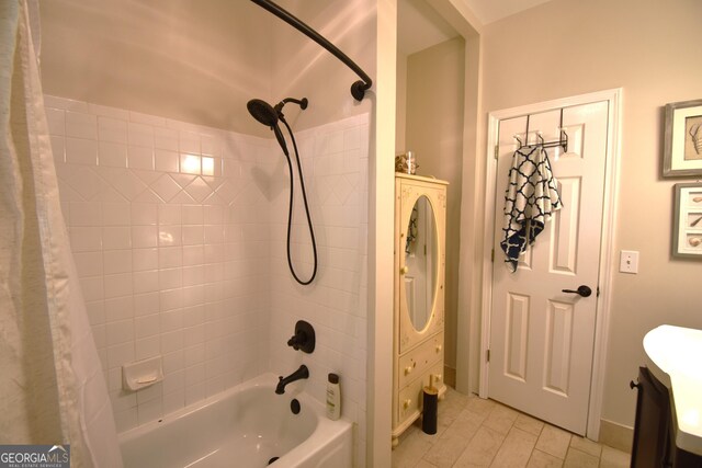 bathroom with vanity and shower / bathtub combination with curtain