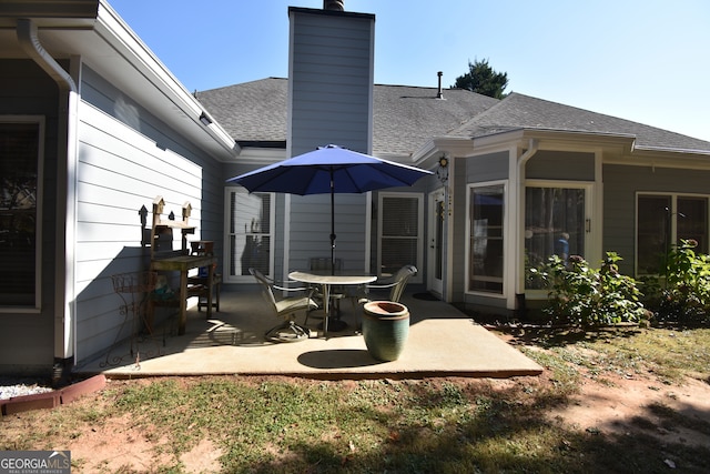 rear view of house with a patio area