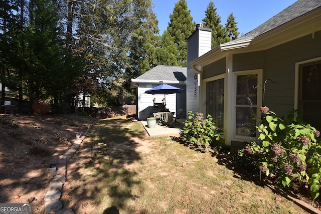 view of yard with a patio area