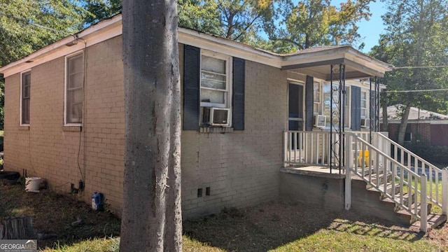 1870 Bethlea Ave, Macon, GA 31204 - view of side of property featuring cooling unit and brick siding