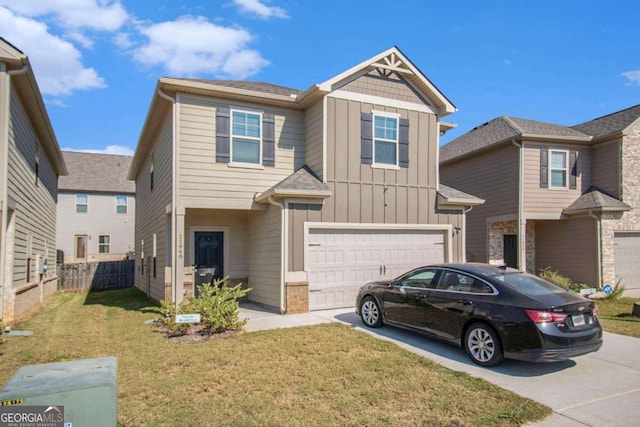 view of front of home featuring a garage and a front lawn