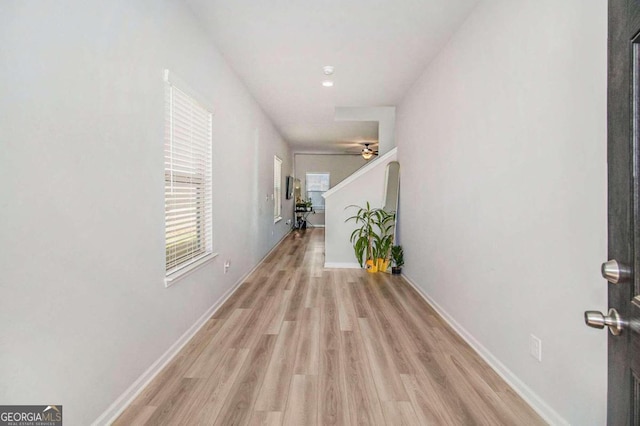 corridor featuring light wood-type flooring