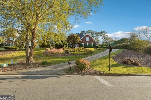 exterior space featuring a front lawn