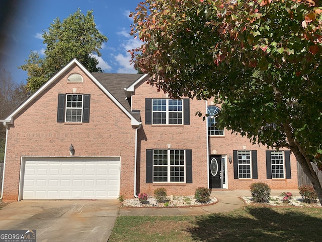 view of front of house with a garage