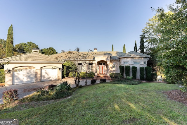 view of front of home with a chimney, stucco siding, concrete driveway, and a front yard