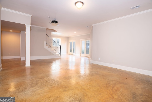 unfurnished living room with concrete floors, stairs, ornamental molding, baseboards, and ornate columns