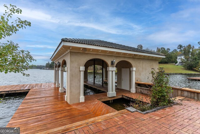 dock area featuring a water view