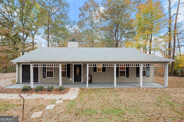 ranch-style home with a patio