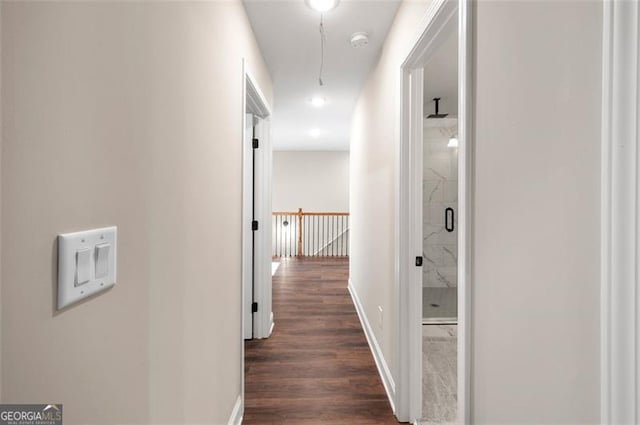 hallway featuring dark hardwood / wood-style flooring