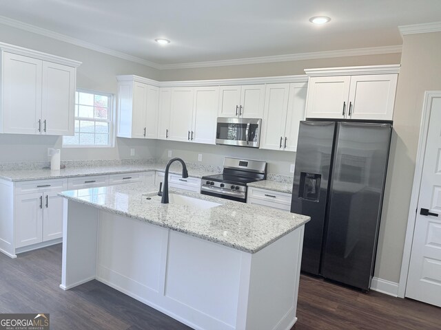 kitchen with sink, a center island with sink, stainless steel appliances, light stone countertops, and white cabinets