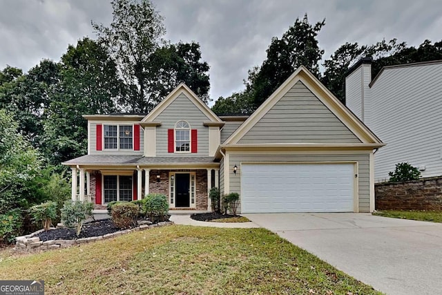 view of front of house featuring a garage, a front lawn, and a porch