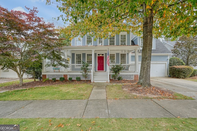 view of front of house with covered porch and a garage