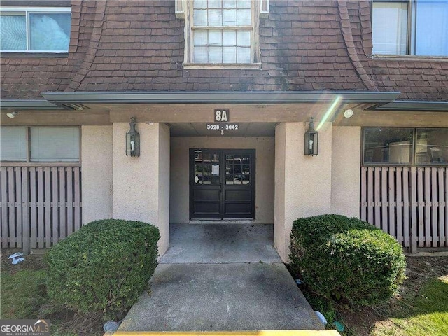 doorway to property with a porch