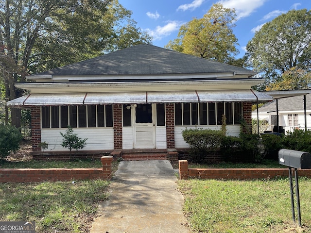 view of front of home featuring covered porch