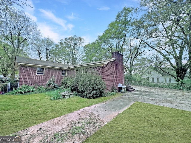 exterior space with a yard