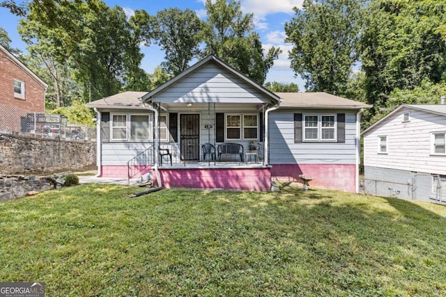 bungalow with a front lawn