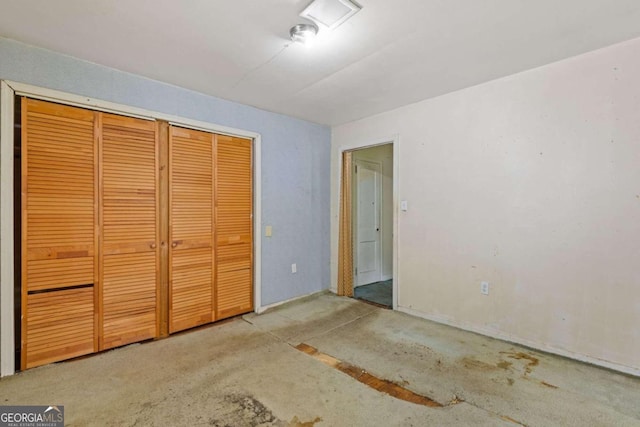 unfurnished bedroom featuring a closet