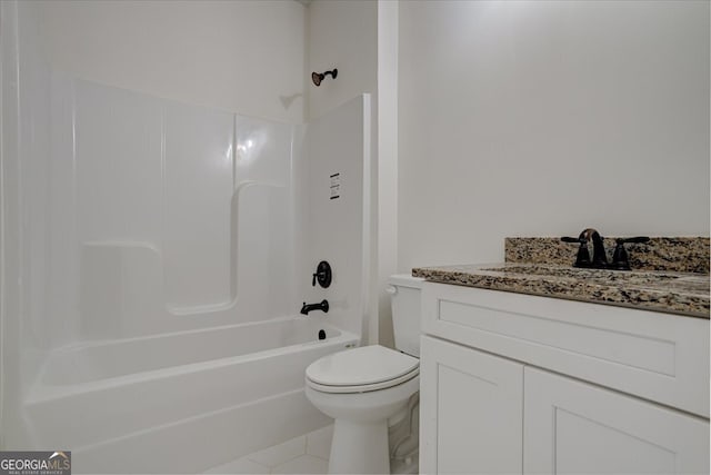 full bathroom with tile patterned floors, shower / washtub combination, vanity, and toilet