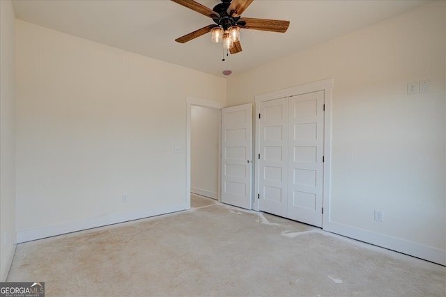 unfurnished bedroom with a closet and ceiling fan