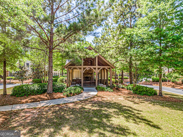 surrounding community featuring a lawn