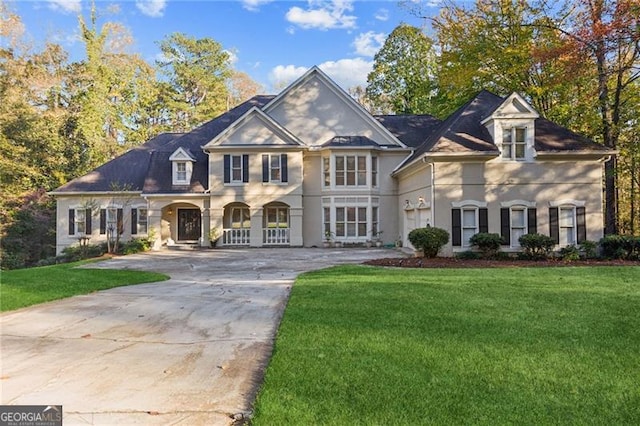 456 N Saint Marys Ln, Marietta, GA 30064 - view of front of house with driveway and a front lawn