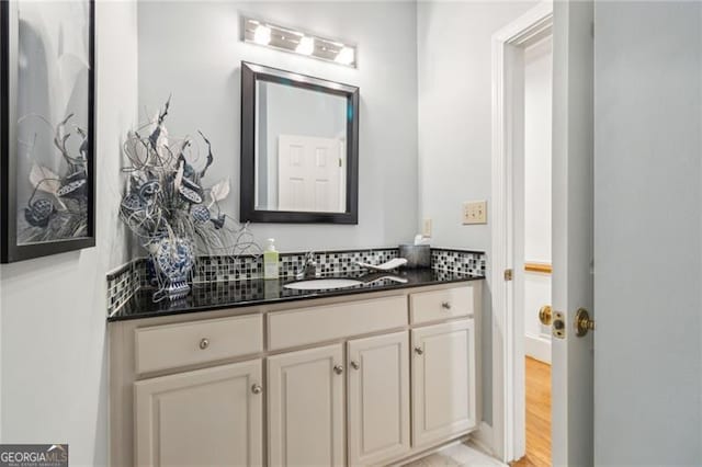 456 N Saint Marys Ln, Marietta, GA 30064 - bathroom with vanity and decorative backsplash