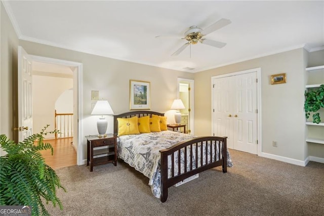 bedroom with carpet floors, a closet, ceiling fan, and crown molding