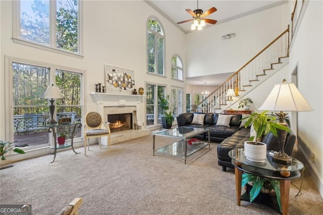 456 N Saint Marys Ln, Marietta, GA 30064 - living room with a towering ceiling, stairway, carpet floors, plenty of natural light, and a fireplace