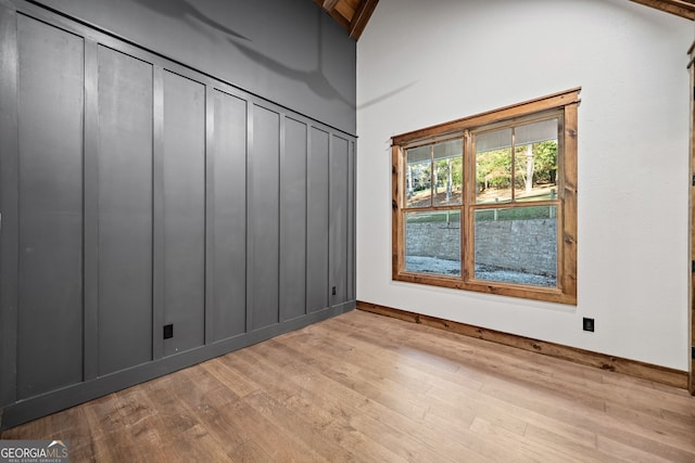 spare room with light hardwood / wood-style floors