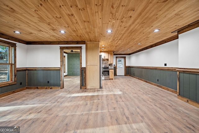 unfurnished room featuring ornamental molding, light wood-type flooring, and wooden ceiling