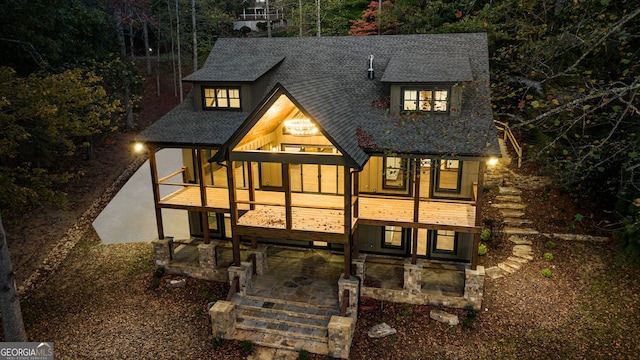 back of house featuring a patio