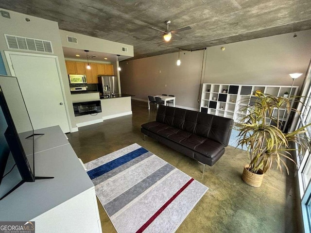 living room with ceiling fan