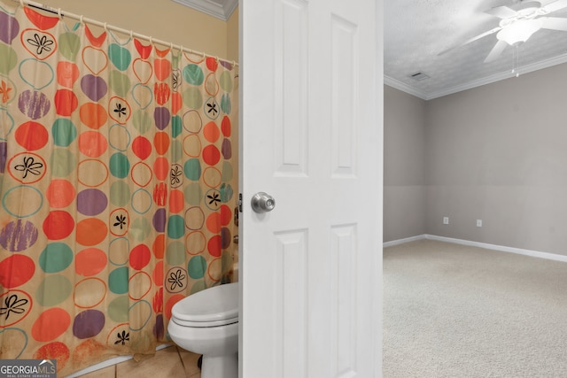 bathroom with toilet, crown molding, a textured ceiling, and ceiling fan