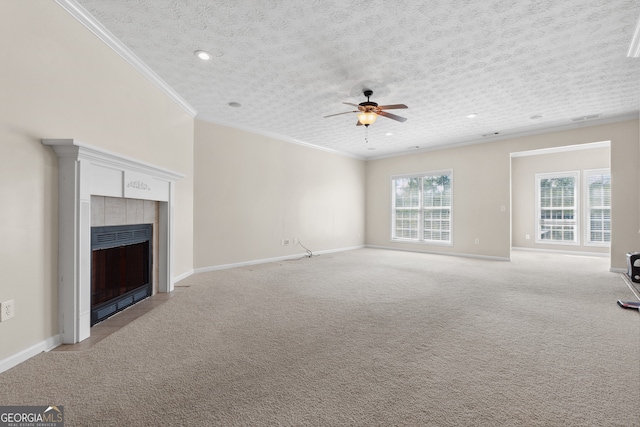 unfurnished living room featuring light carpet, a textured ceiling, a fireplace, and ceiling fan