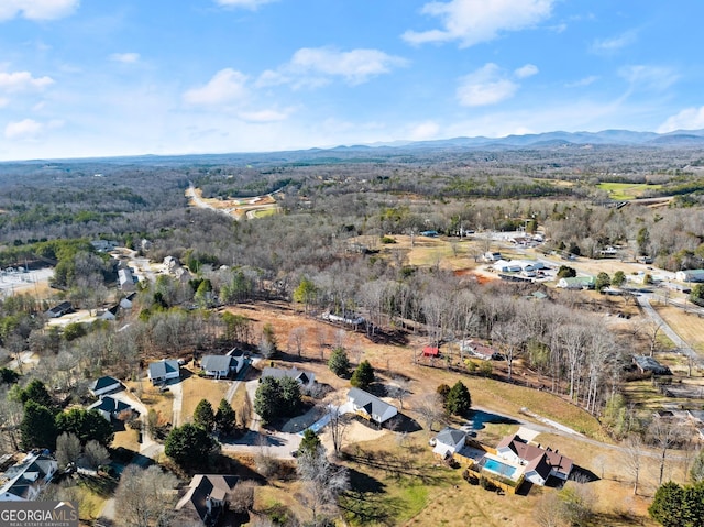 drone / aerial view featuring a mountain view