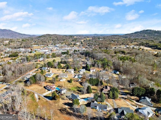 drone / aerial view featuring a mountain view