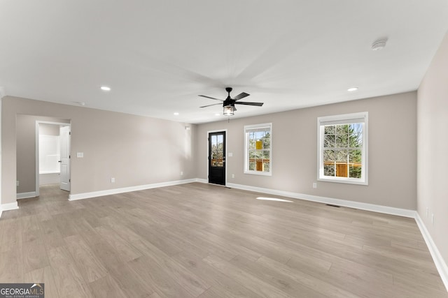 interior space featuring ceiling fan and light hardwood / wood-style floors