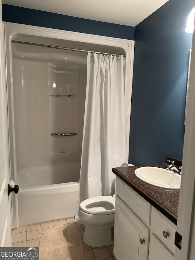 full bathroom with vanity, toilet, shower / bath combination with curtain, and tile patterned flooring