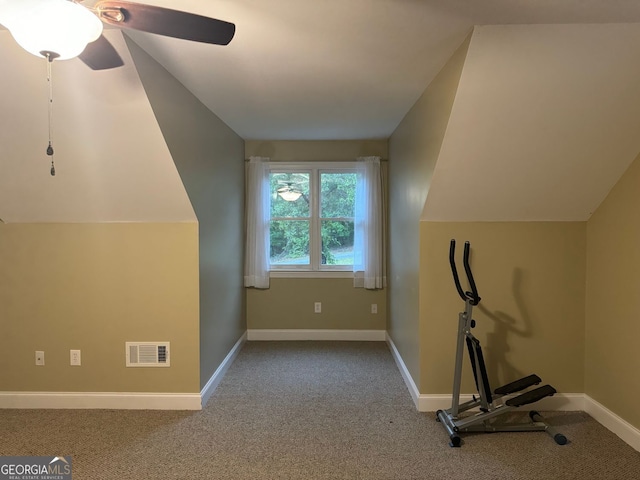 bonus room featuring ceiling fan, vaulted ceiling, and light colored carpet