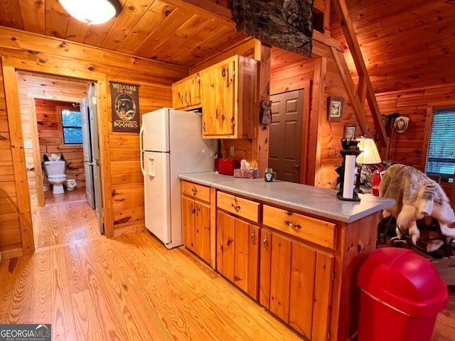 kitchen featuring wooden ceiling, wood walls, light wood-type flooring, and kitchen peninsula